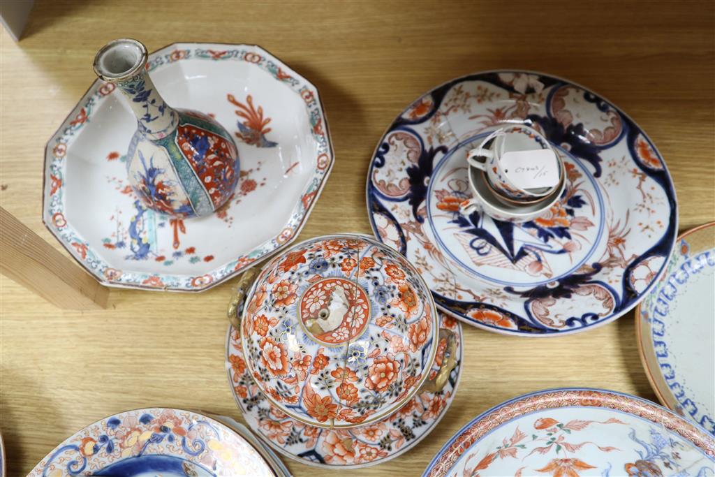 A collection of mixed Chinese and Japanese ceramics, mostly damaged